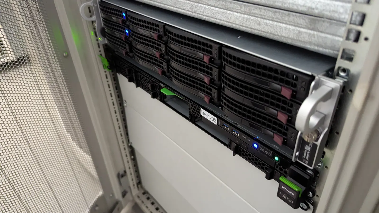 The front of a storage node in the Frankfurt rack, drive bays lit