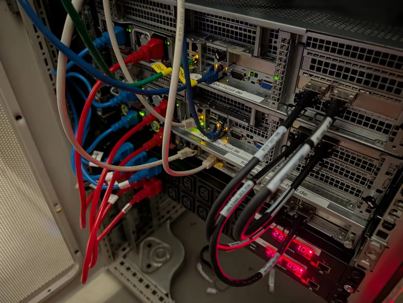 Patch cables and uplinks at the back of the rack